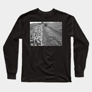 Ancient stone wall on historical Roman camp in rural Norfolk, UK Long Sleeve T-Shirt